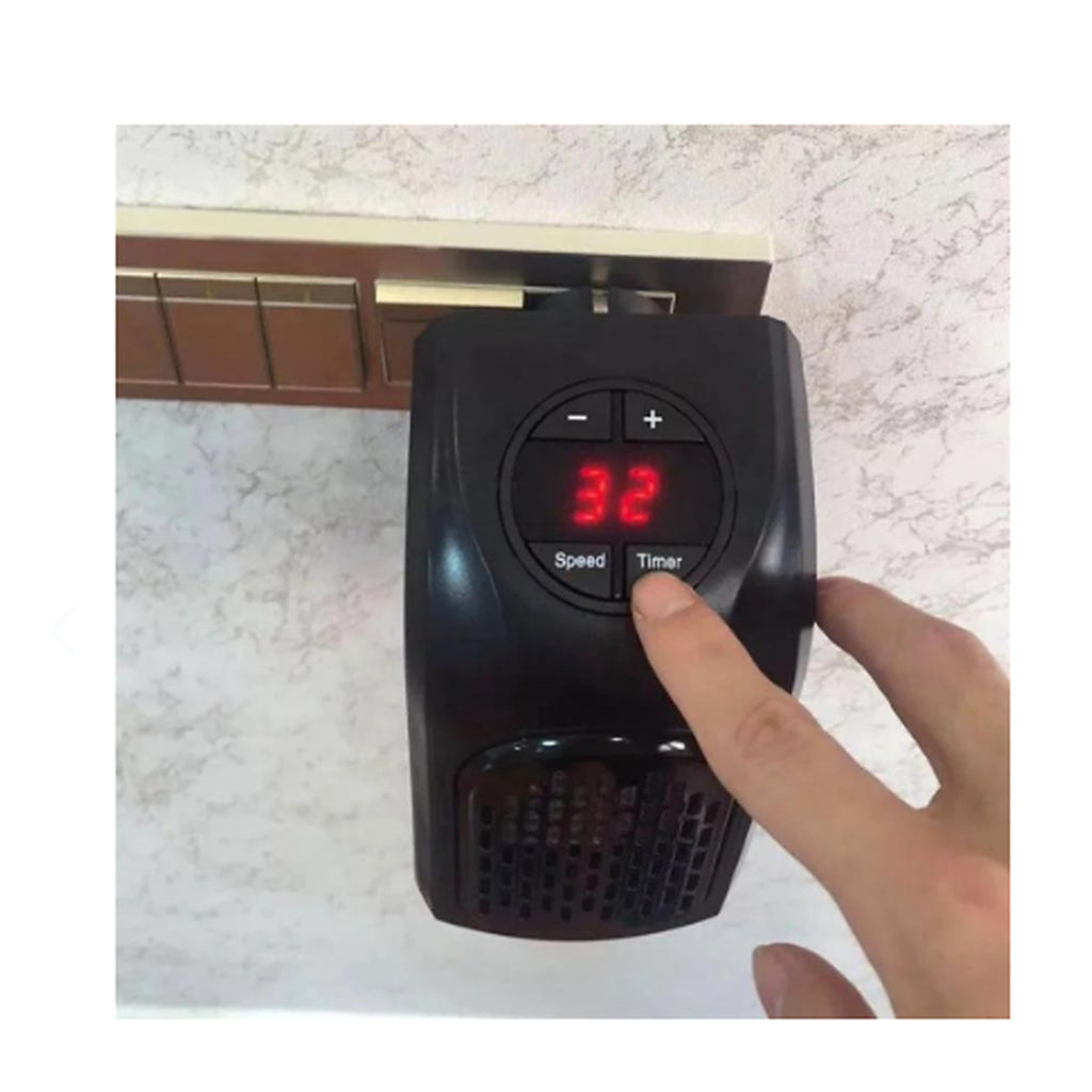 Mini Calentador PTC Enchufe + Control Remoto — en uso enchufe